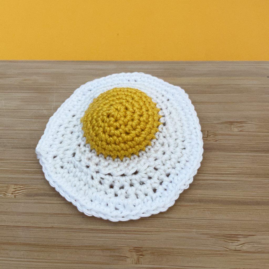 a crochet fried egg